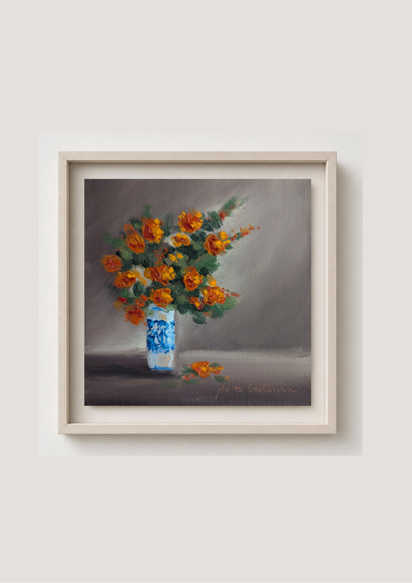 Oil painting of a bouquet of orange flowers in a blue and white vase on a gray background. Original oil painting of an autumnal trio of flowers or fruits, warm amber and rust tones still life
