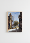 A framed watercolor painting of a city street scene with buildings, a tree, and a red car, displayed on a clean white wall. Birmingham Museum and Art Gallery from Edmund Street - limited edition fine art print by Marta Stolarska, based on original watercolour, A4 archival matt paper, edition of 50, hand signed and numbered