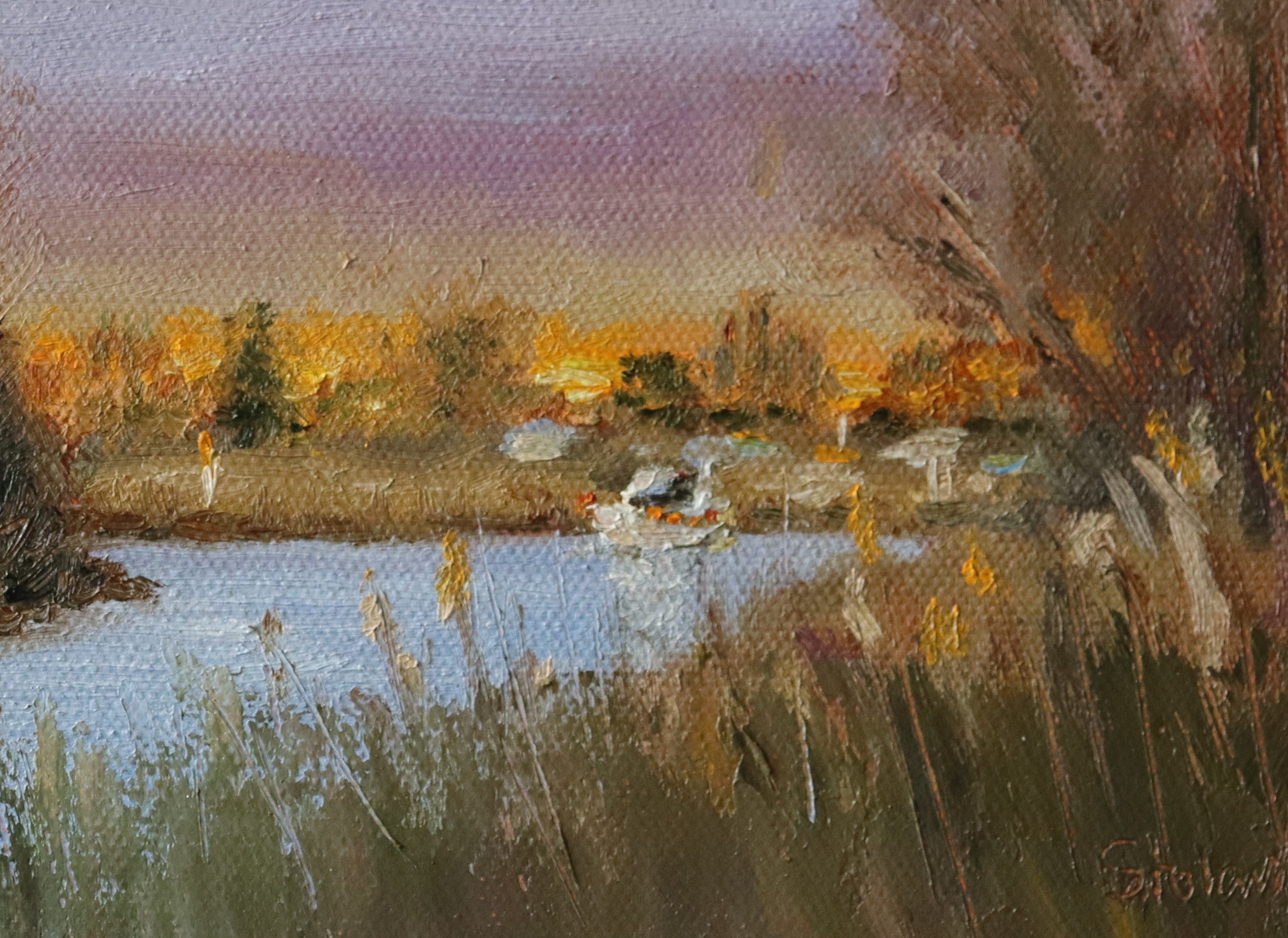 Painting of a landscape with a river, trees, and a house at sunset. Original oil painting of boaters enjoying sunset at the Suffolk marshes, warm evening light on water by local artist