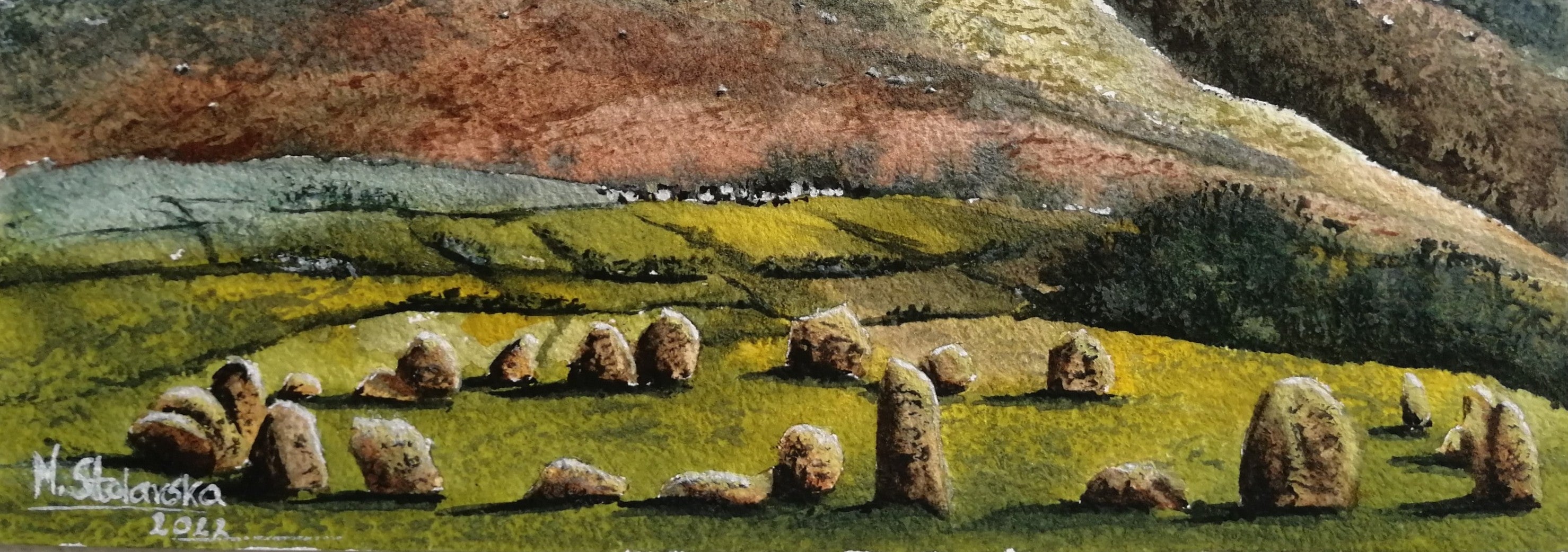 Artistic depiction of a stone circle with rolling hills in the background. Original watercolour painting of Castlerigg Stone Circle with snow-capped Lake District fells behind, light airy sky