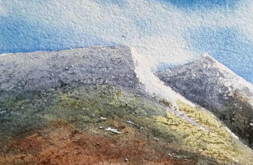 Original watercolour painting of Castlerigg Stone Circle with snow-capped Lake District fells behind, light airy sky