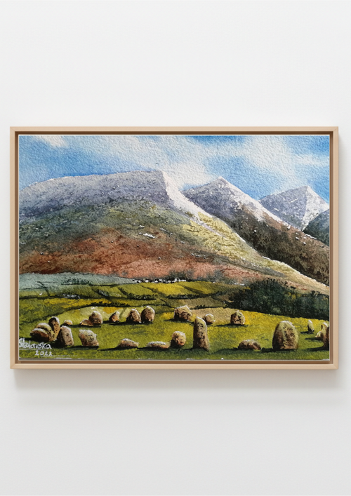 Original watercolour painting of Castlerigg Stone Circle with snow-capped Lake District fells behind, light airy sky