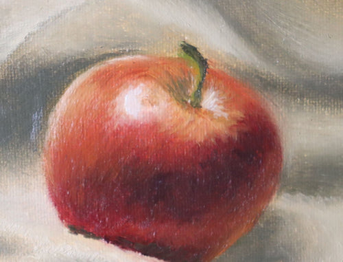 Close-up detail of Before the Apple Pie - apple resting on fabric, expressive oil brushwork on handmade linen board by Marta Stolarska
