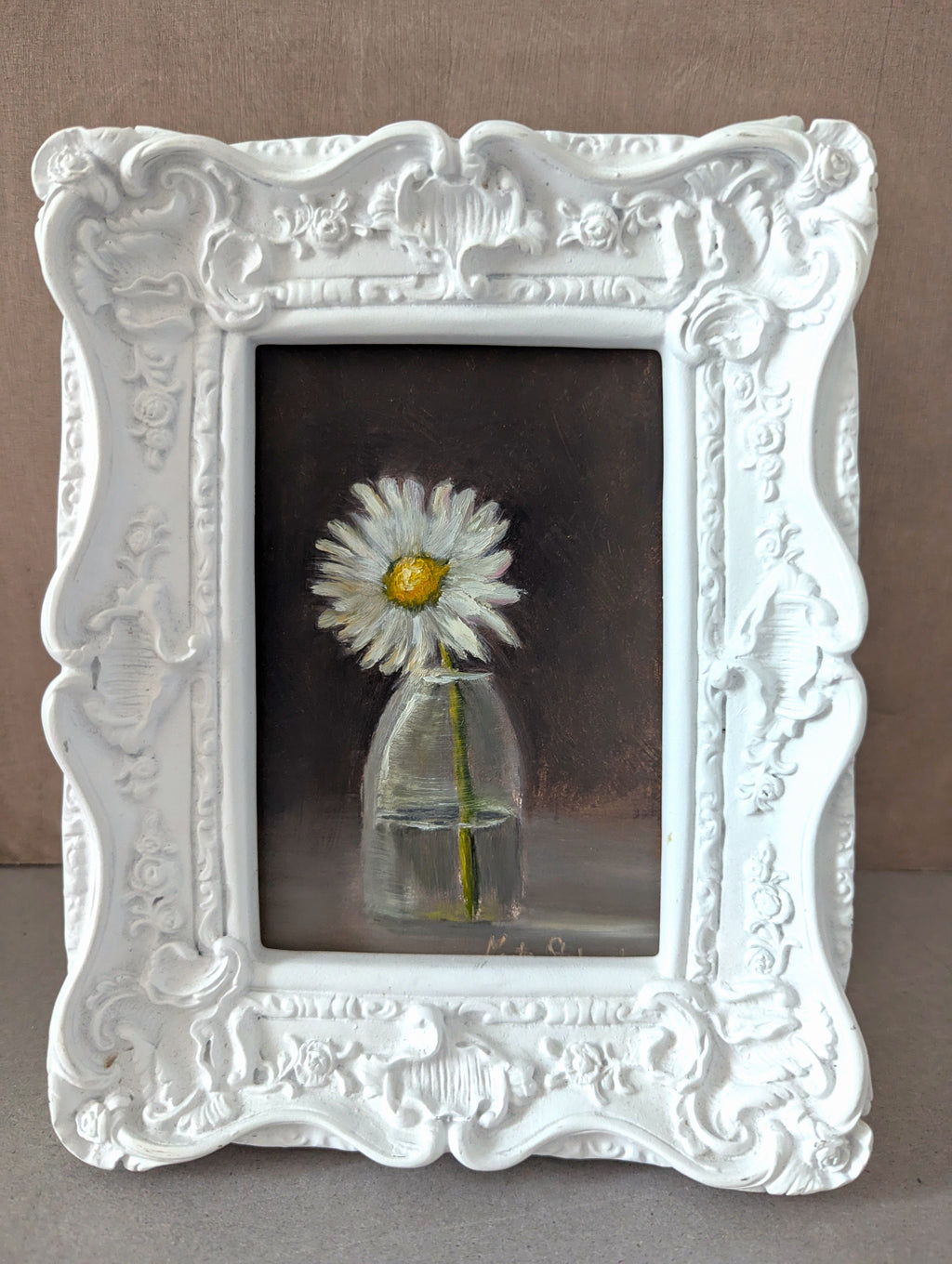 The Garden Daisy original oil painting hung on a wall - white daisy in glass vase in ornate white rococo-style clay frame, approx. 18.5 x 23.5 cm, by Marta Stolarska Fine Art, can hang or stand