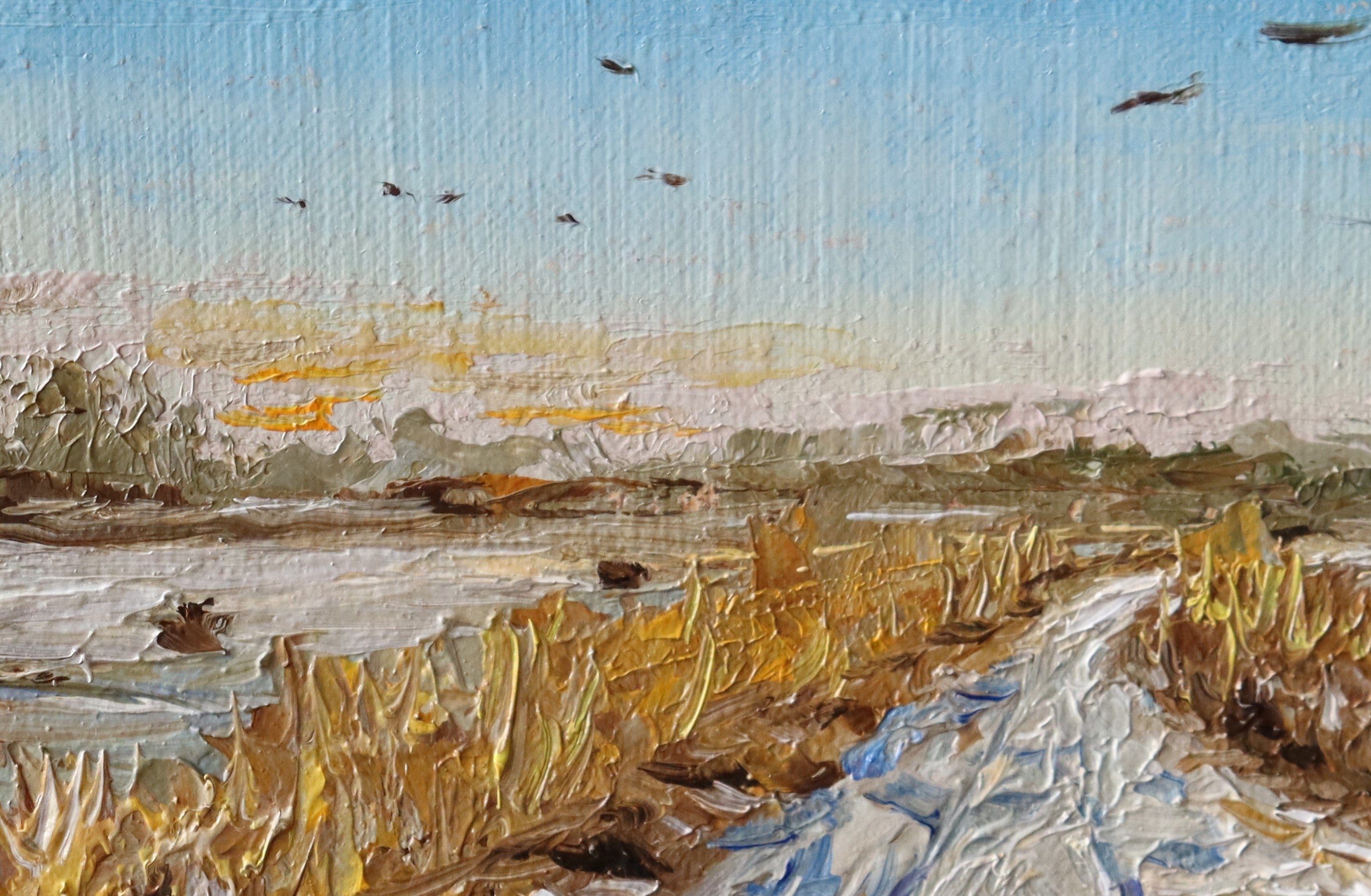 Painting of a rural landscape with a path, fields, and birds in the sky by a local artist. Original oil painting of geese in flight over snowy Oulton Broad marshes, snow-covered bridleway leading into scene