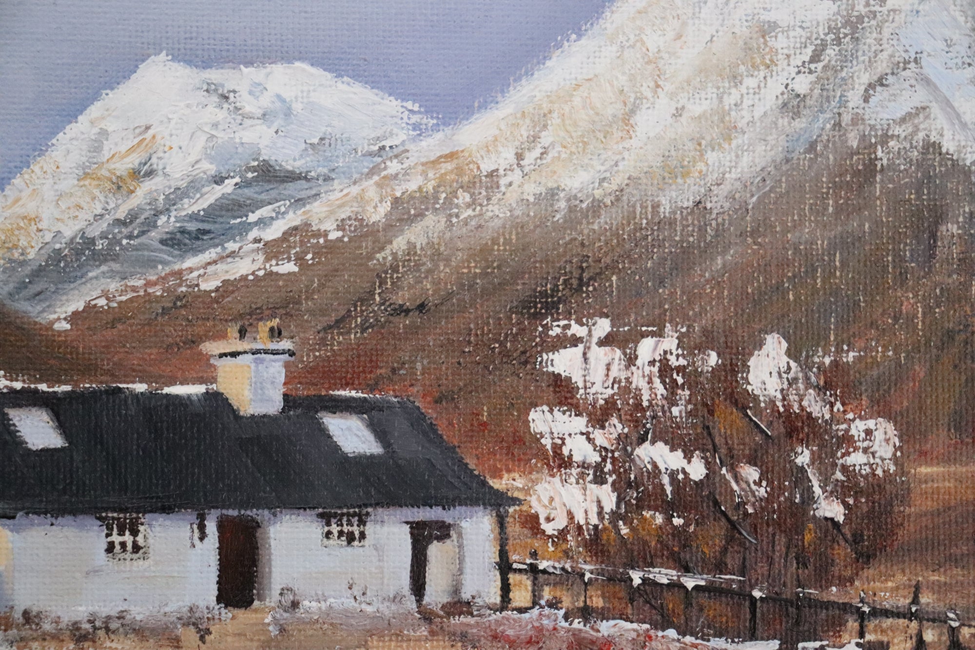 Original oil painting of iconic cottage in Glencoe Scotland in winter, snow-capped mountains, white frame