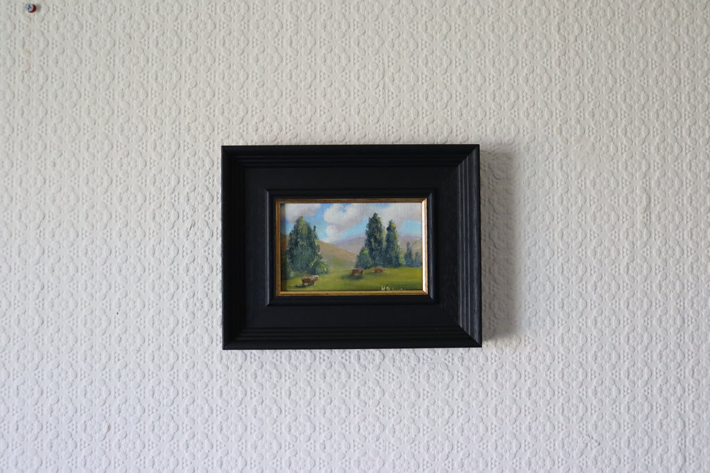 Framed Original oil painting of cattle or sheep grazing with a view over open landscape, Suffolk countryside