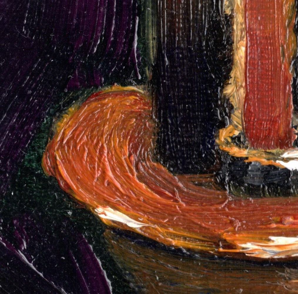 Close-up of a textured painting with orange, black, and purple colors.