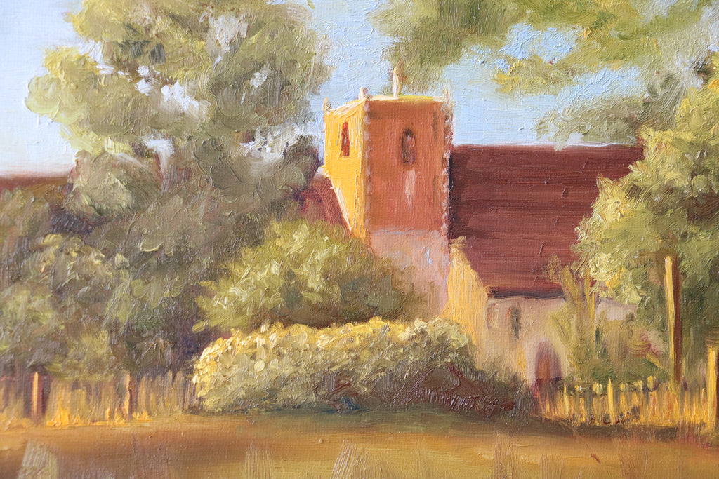 Painting of a church surrounded by trees and greenery. Original oil painting of St Michael's Church Oulton Broad Suffolk at sunset, golden light on stone