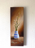 Little Sparkles original oil painting hung on a wall - elongated 20x60cm deep edge canvas, white vase and blossom still life by Marta Stolarska, exhibited at RBSA Birmingham