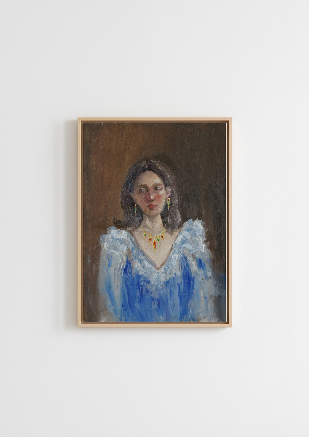 Lost in Her Thoughts - original oil figure painting by Marta Stolarska, dark-haired woman with blushed cheeks gazing away in a light blue frill blouse, oil on canvas board, Subtle Expressions collection