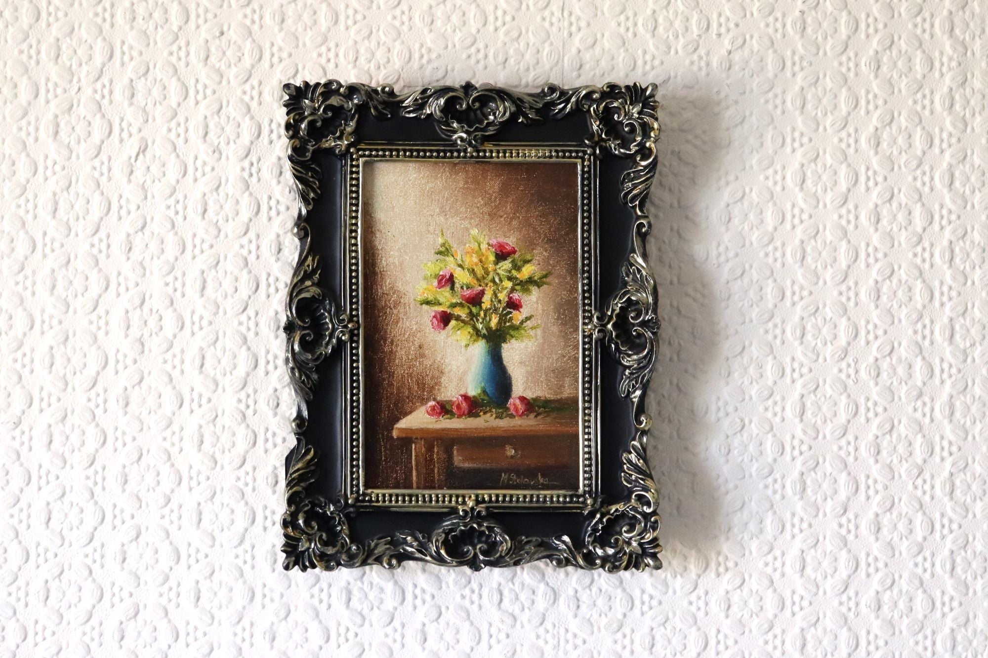 Hot Air and Roses original oil painting hung on a wall - pink roses in cobalt blue vase in ornate black and silver rococo-style frame, approx. 18.5 x 23.5 cm, by Marta Stolarska Fine Art, can hang or stand