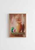 A framed still life painting featuring a large terracotta-colored vase on a shelf next to a green jug and a small red-and-white patterned pot, hung on a plain white wall.