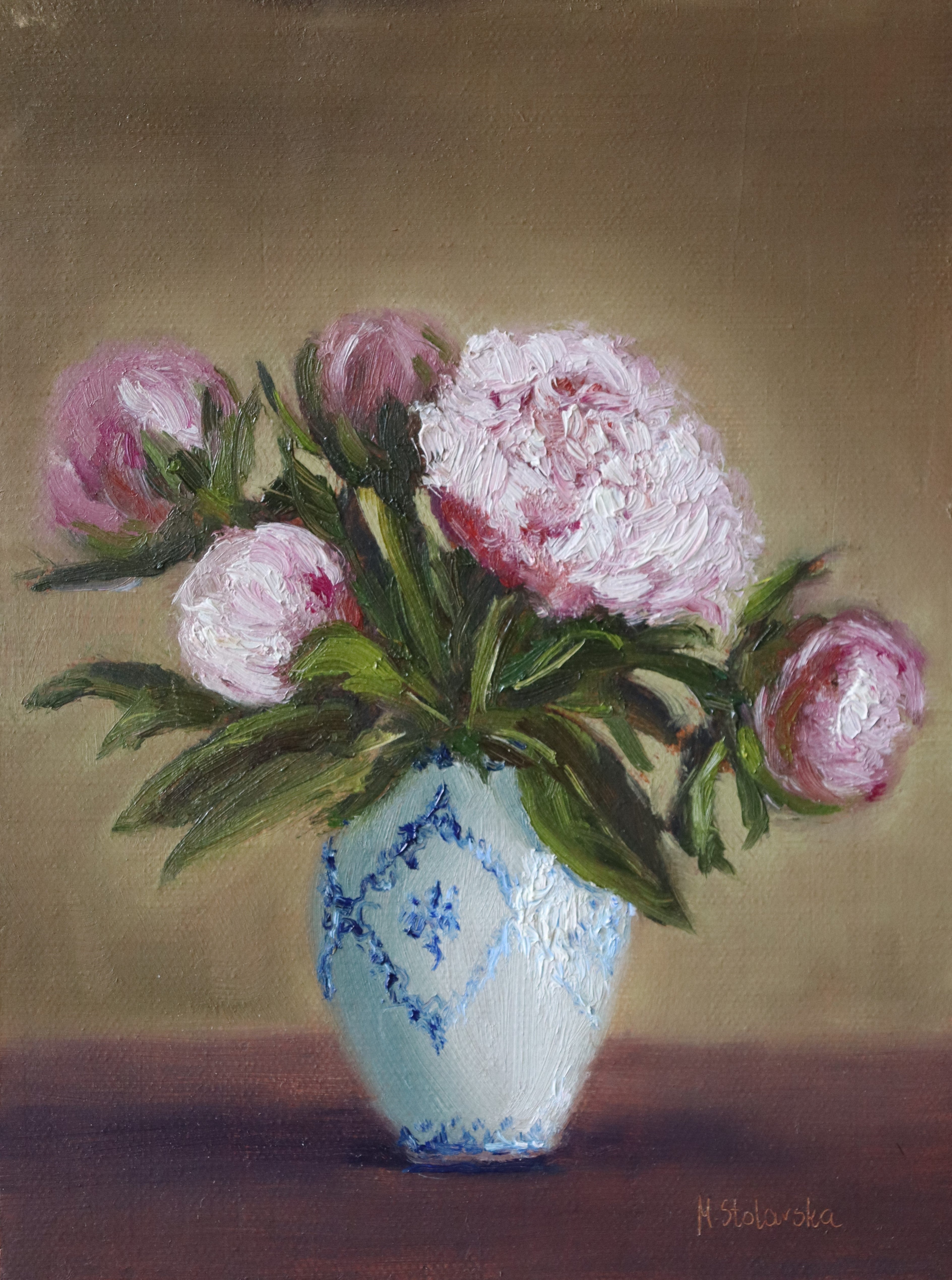 Painting of pink peonies  and a white and blue vase on a table. Original oil painting of five pink peonies in a white vase with blue design, at different stages of bloom