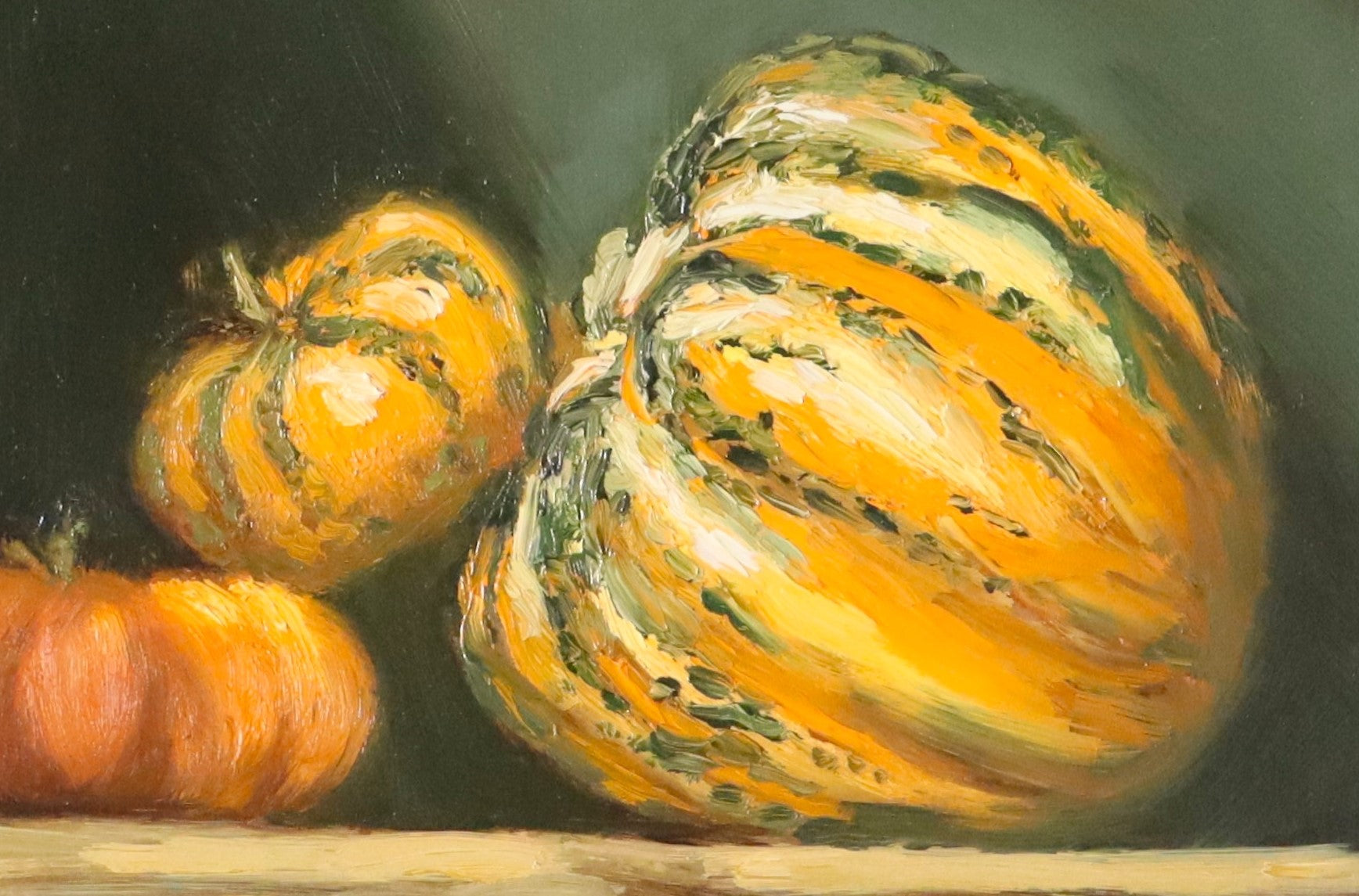 close up three pumpkins on a reflective surface with a dark background, classical still life.