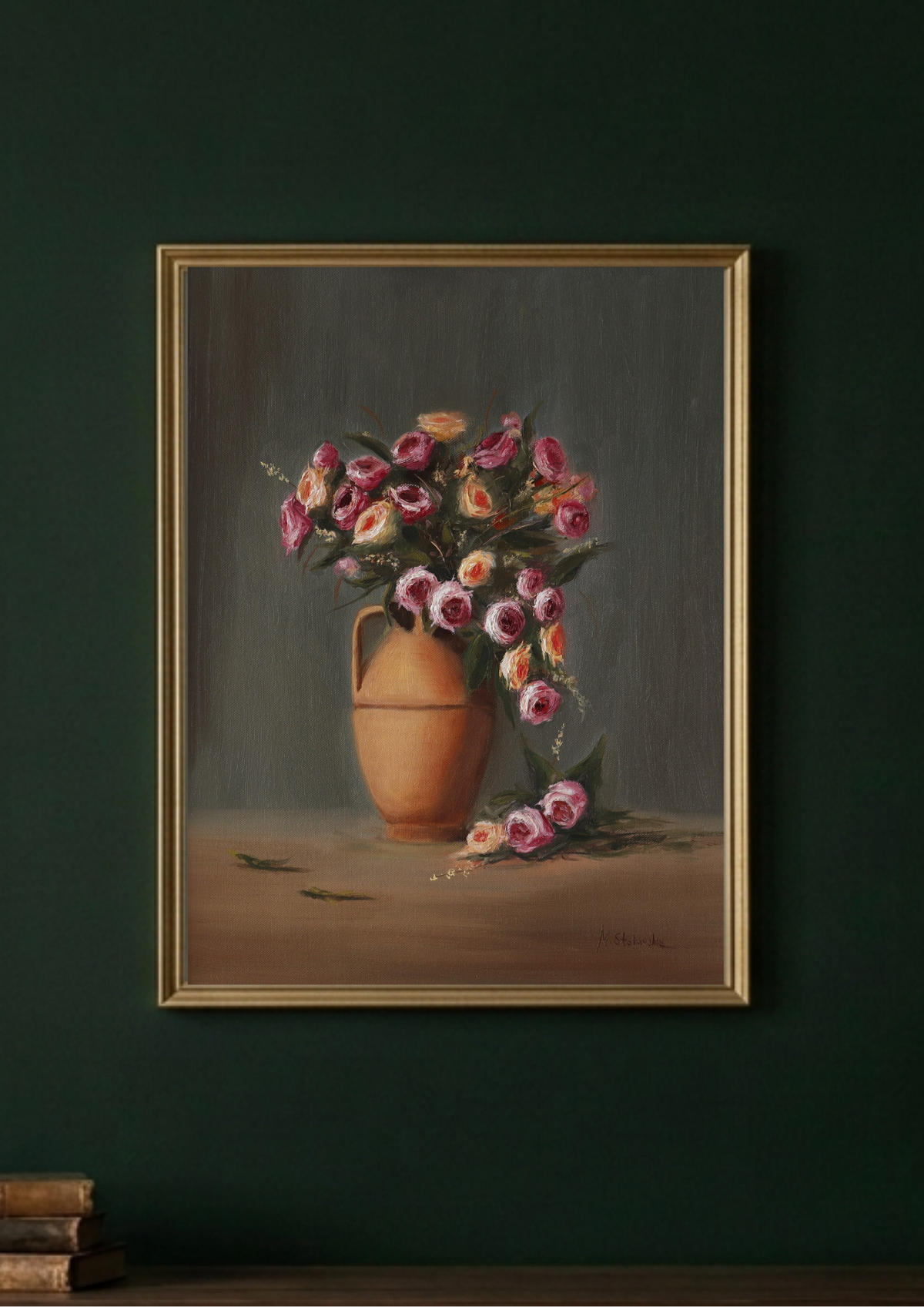 A framed still life painting of a pink and purple flower bouquet in a terracotta vase, hanging on a plain white wall. Original oil painting Rose Magic by Marta Stolarska - patio roses in a terracotta vase with fallen petals, light moving across the composition, 50x40cm on handmade canvas board