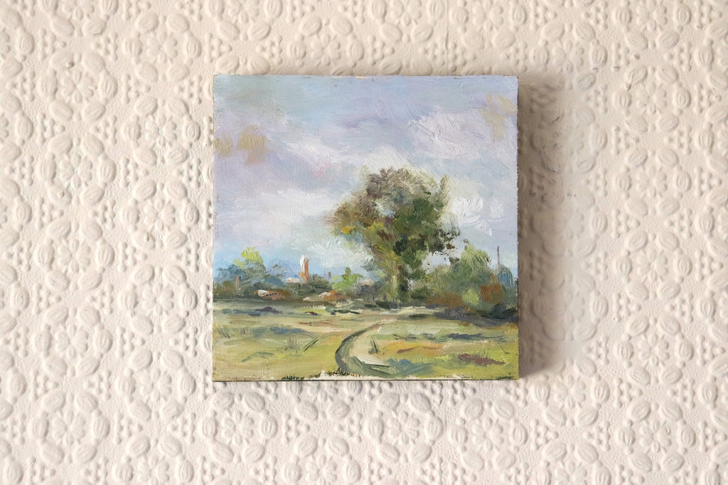 Small Marsh Study - original oil painting of Oulton Marshes, Suffolk, in early spring with a winding path, trees and church tower in warm breezy light. Oil on cradled wooden panel, 4.7 x 4.7 inches, by Marta Stolarska.