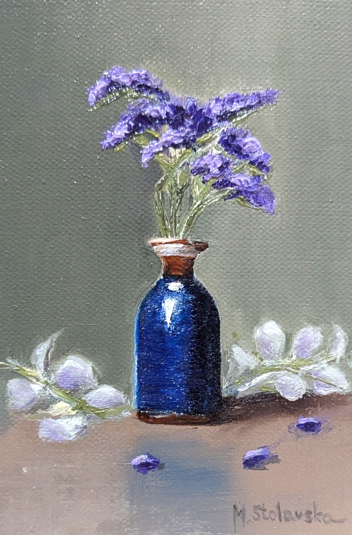 The Forgotten Flowers - original oil painting by Marta Stolarska, purple statice sprigs in a cobalt blue ceramic bottle with gold rim against a sage-green background, painted on handmade linen board, 10 x 15 cm