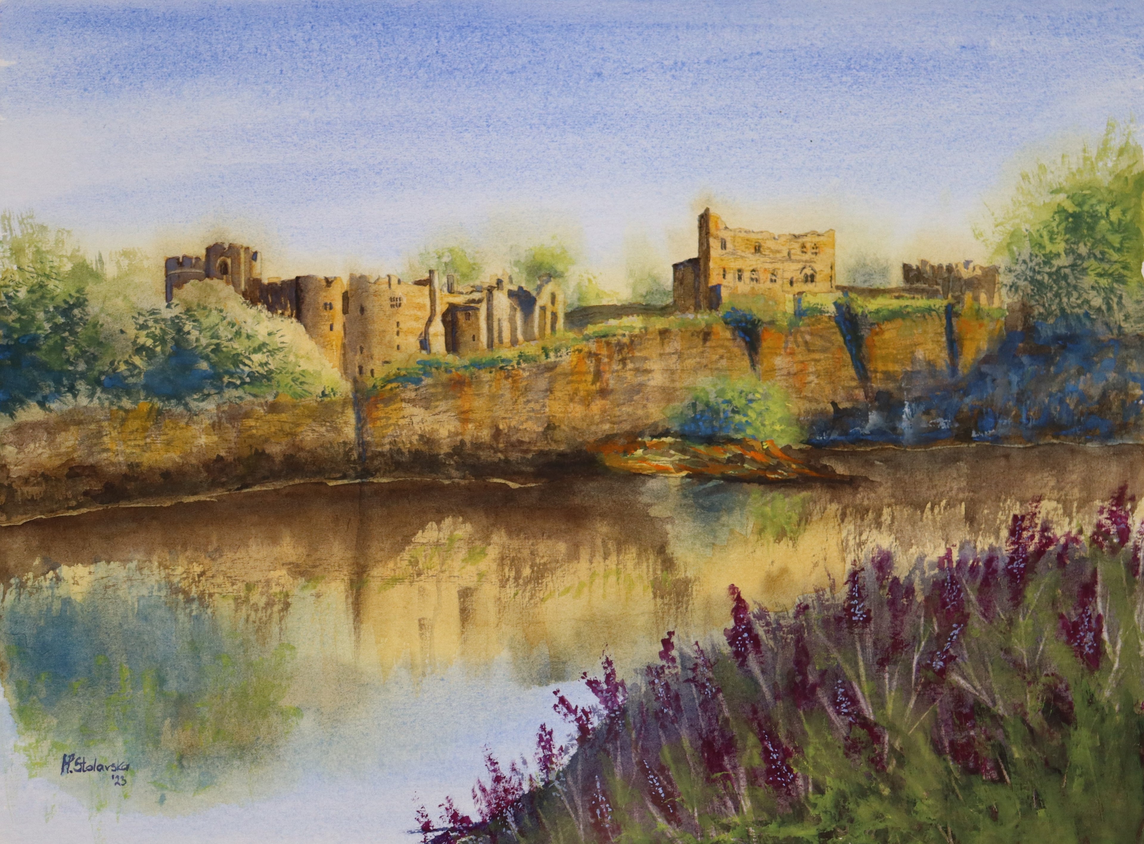 Painting made by a local artist. Original watercolour painting of Chepstow Castle and cliffs from across the River Wye, Wales, Britain's oldest stone fortress. Watercolor painting of a castle by a lake with purple flowers in the foreground.