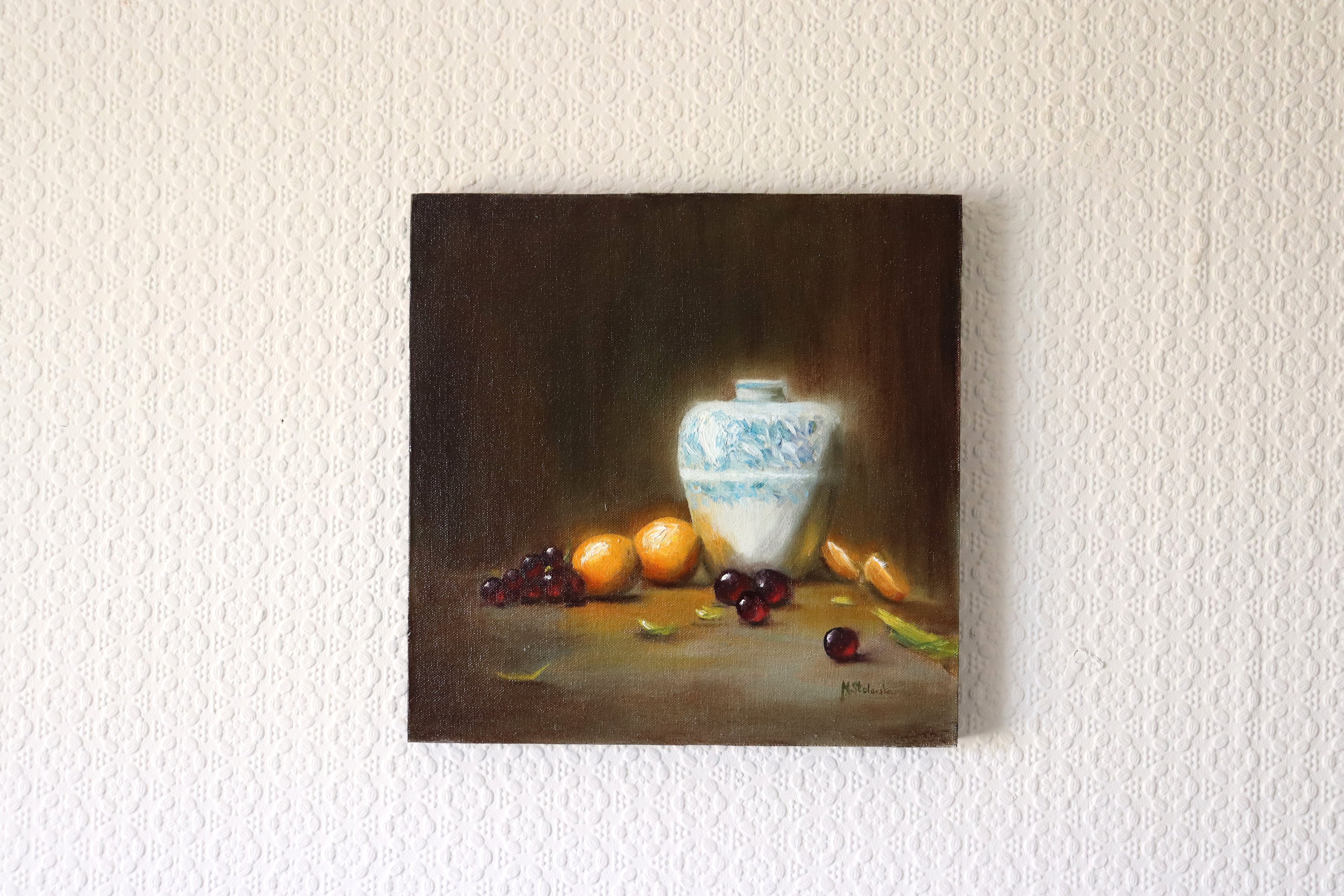 Bouncing Light original oil still life hung on a wall - large white vase with reflected light, oranges and grapes, 30x30cm cradled wooden panel by Marta Stolarska Fine Art, ready to hang