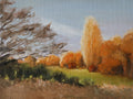 Local artist. Original oil painting of sunset at the stables, trees and golden evening light, Suffolk landscape