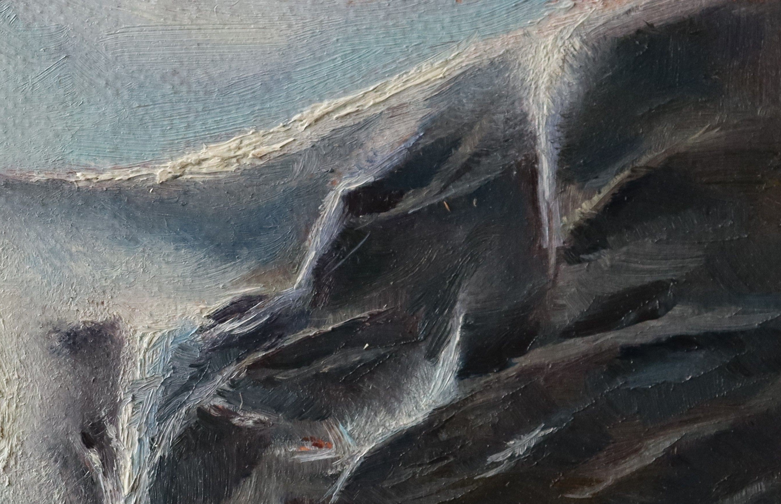Close-up of a textured surface with dark and light grey tones. Original oil painting of an icy waterfall with mist and spray, dramatic winter landscape, black frame with gold bevel