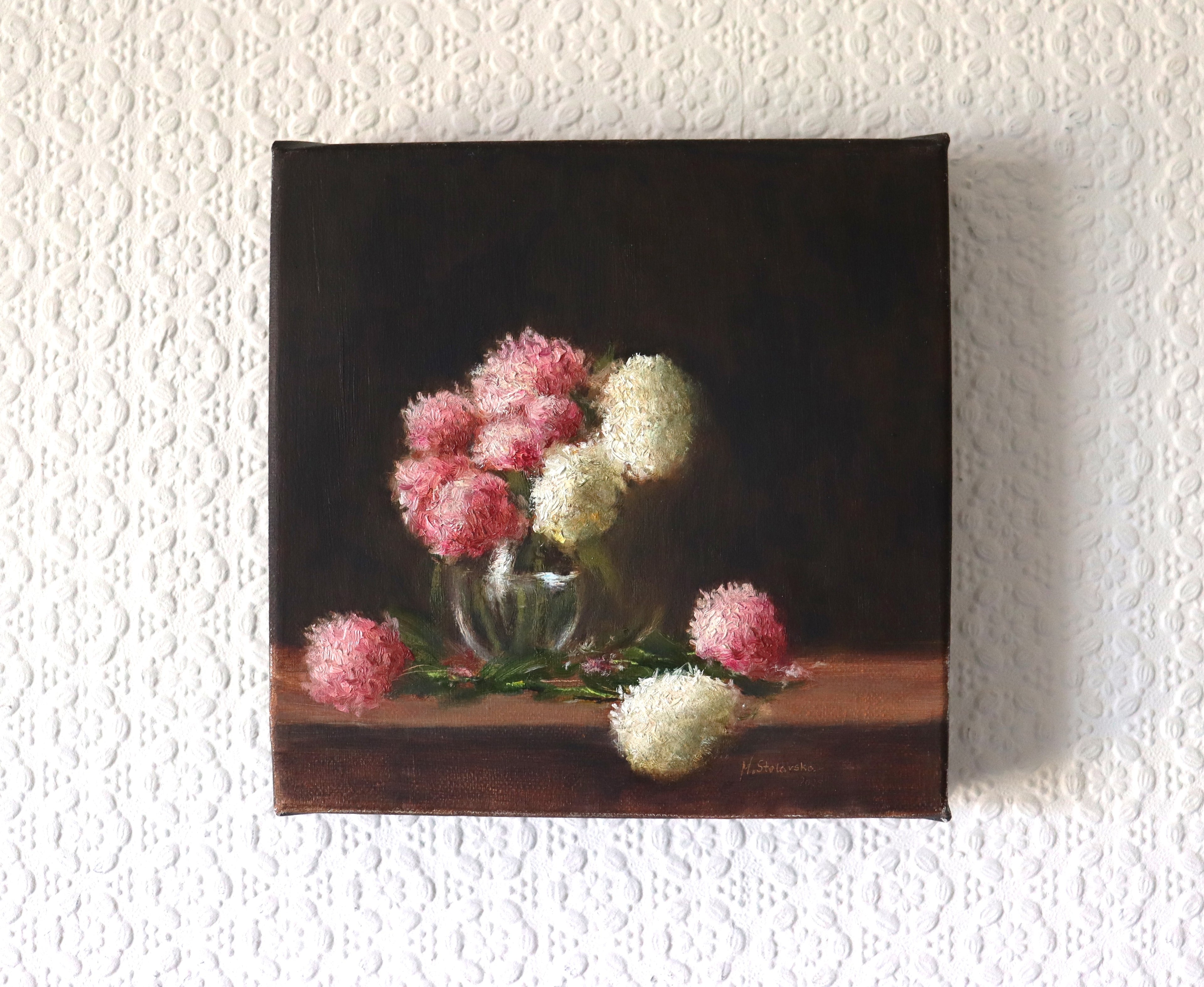 The Delicate Garden Hydrangeas original oil painting hung on a wall - garden-grown pink and white hydrangeas in glass vase, deep edge canvas 20x20cm by Marta Stolarska Fine Art