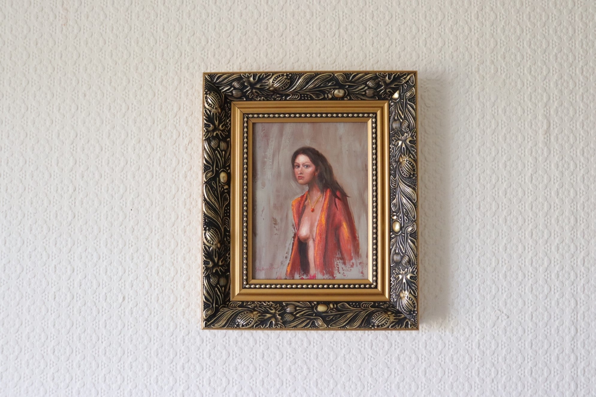 The Interrupted Moment original oil painting hung on a wall - figure painting of woman in red robe, gold framed 25.5x30.5cm by Marta Stolarska, Subtle Expressions collection, ready to hang