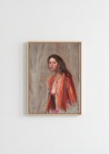 A framed portrait painting of a woman with dark hair, wearing a bright orange-red shawl, hanging on a plain white wall. The Interrupted Moment - original oil figure painting by Marta Stolarska, dark-haired woman in slightly open red robe turning to look back at viewer, oil on canvas board, gold frame 25.5x30.5cm