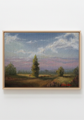 A framed landscape oil painting featuring a tree in a field under a cloudy sky, displayed on a light gray wall.