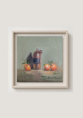 A framed still life painting featuring a brown bottle with a dark label and three small orange fruits on a textured green-gray background, presented in a light wood frame against a neutral beige wall. Original oil painting of a vintage bottle from Riga, antique glass vessel in a warm still life