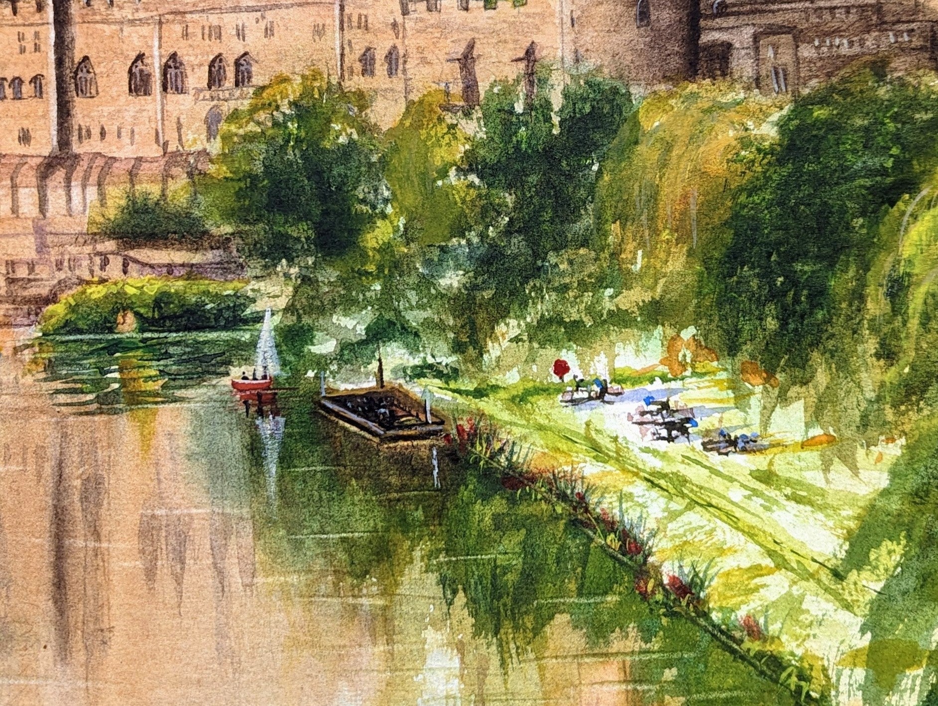Artistic depiction of a river scene with boats and greenery, featuring a castle-like building. Castle by a river with lush greenery. Work by a local artist. Original watercolour painting of Warwick Castle from the River Avon Warwickshire, medieval fortress built 1068