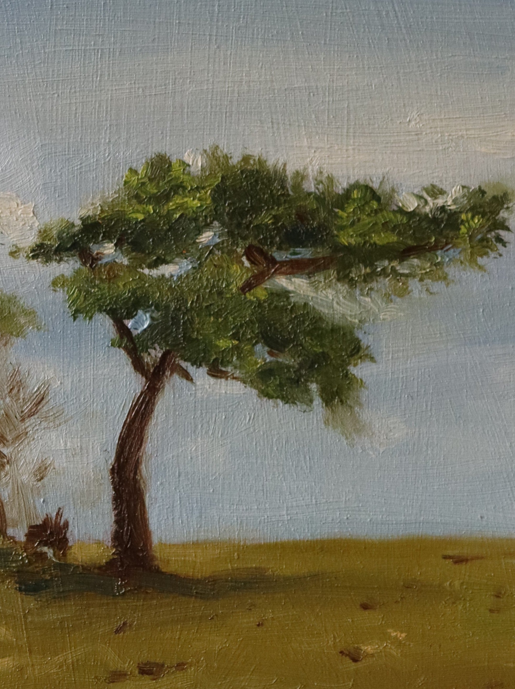 Painting of a tree with green leaves against a blue sky