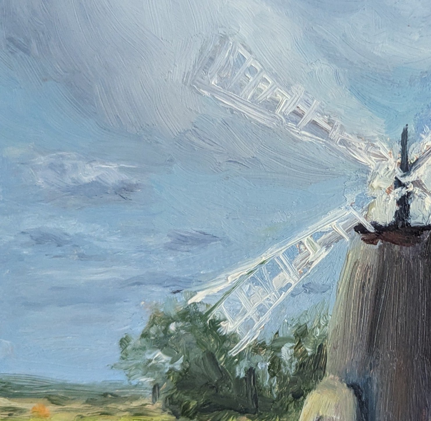 close up of an Original oil painting of a Norfolk windmill in spring, open fields and bright airy sky, framed square format