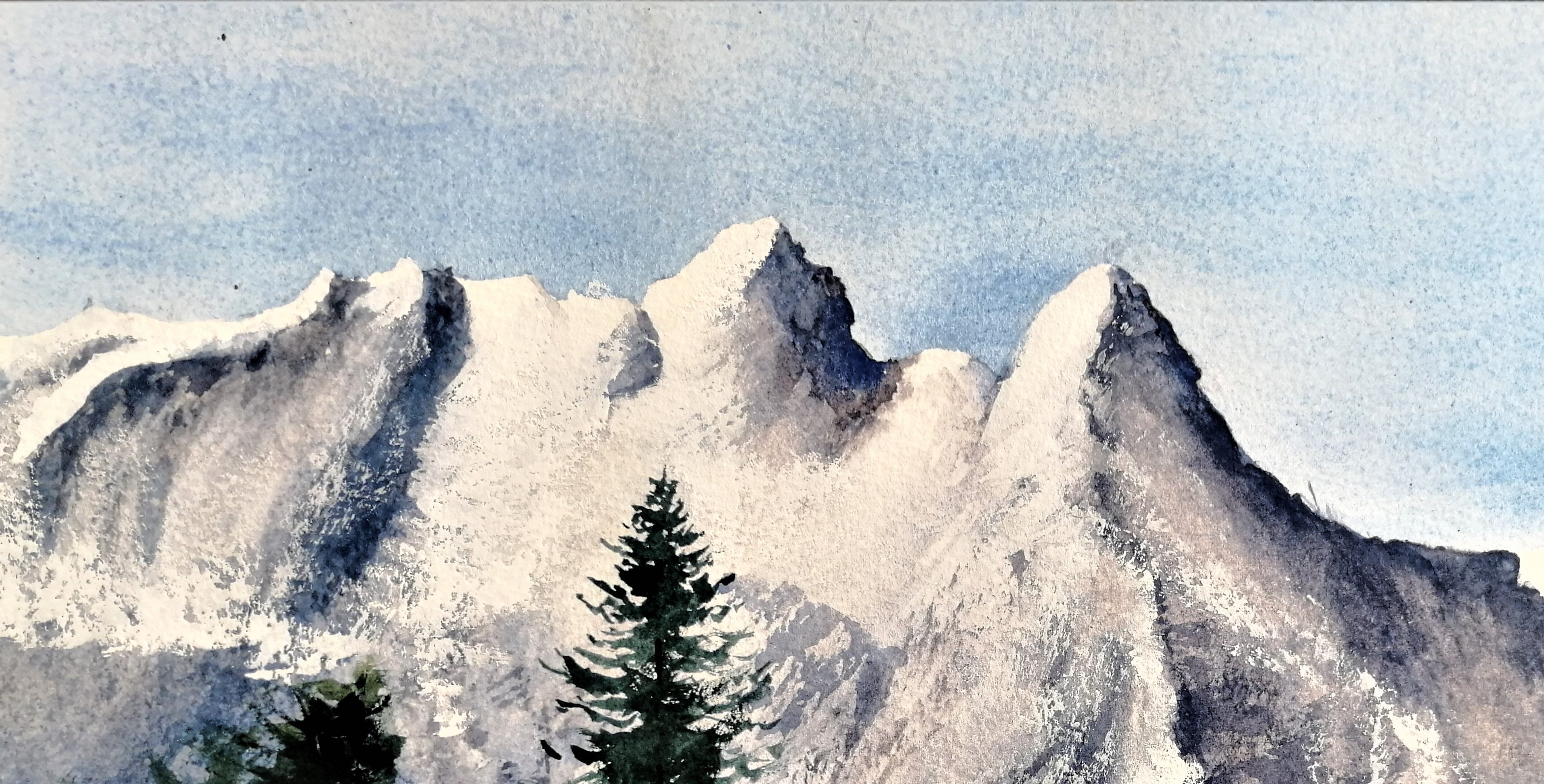 Original watercolour painting of a large snow-covered winter mountain, pale blues and whites on archival cotton paper