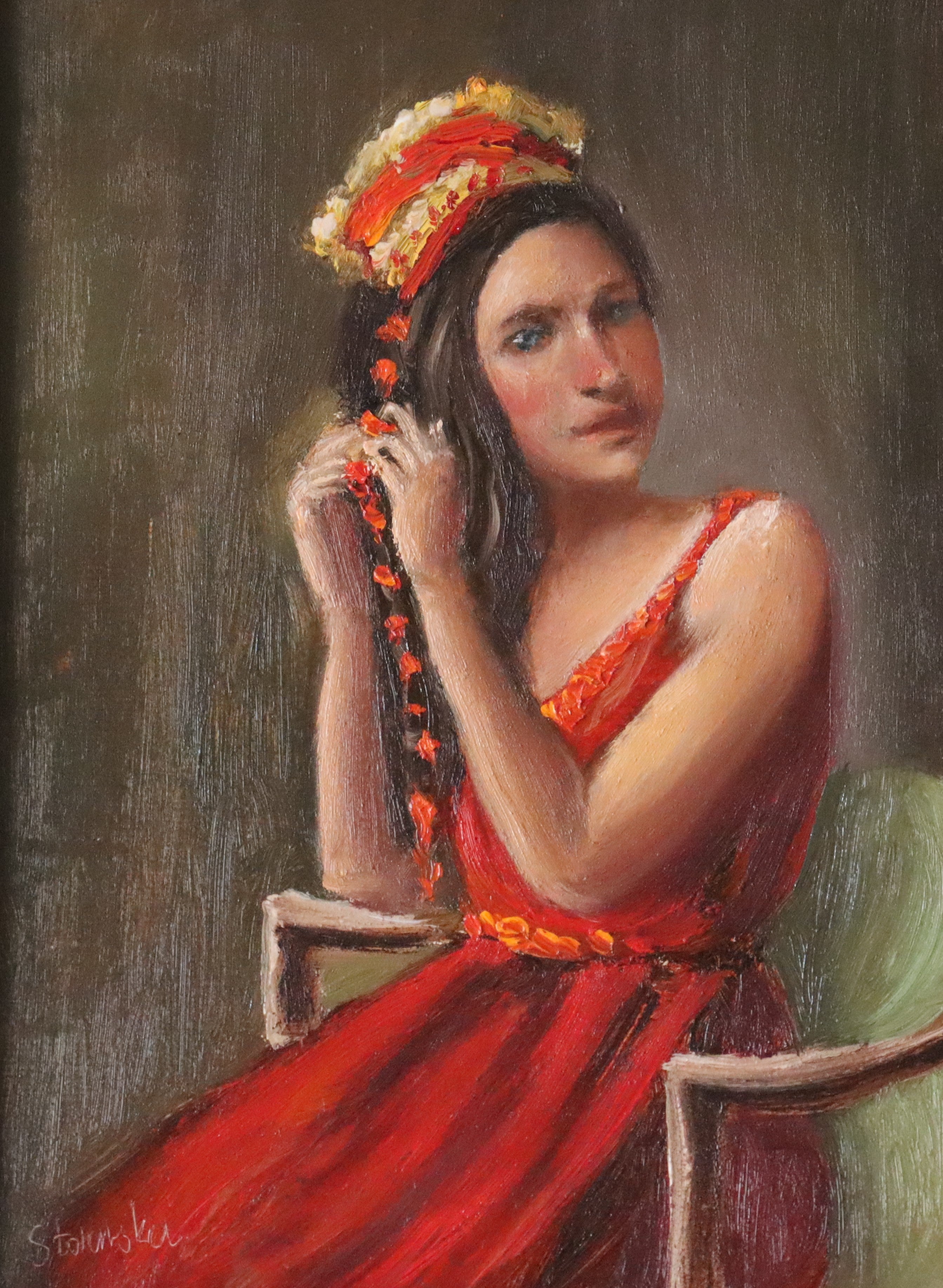 Woven in Tradition - original oil figure painting by Marta Stolarska, woman in red dress and fringed satin shawl braiding a red velvet string, looking directly at viewer with joyous blue eyes, oil on canvas board