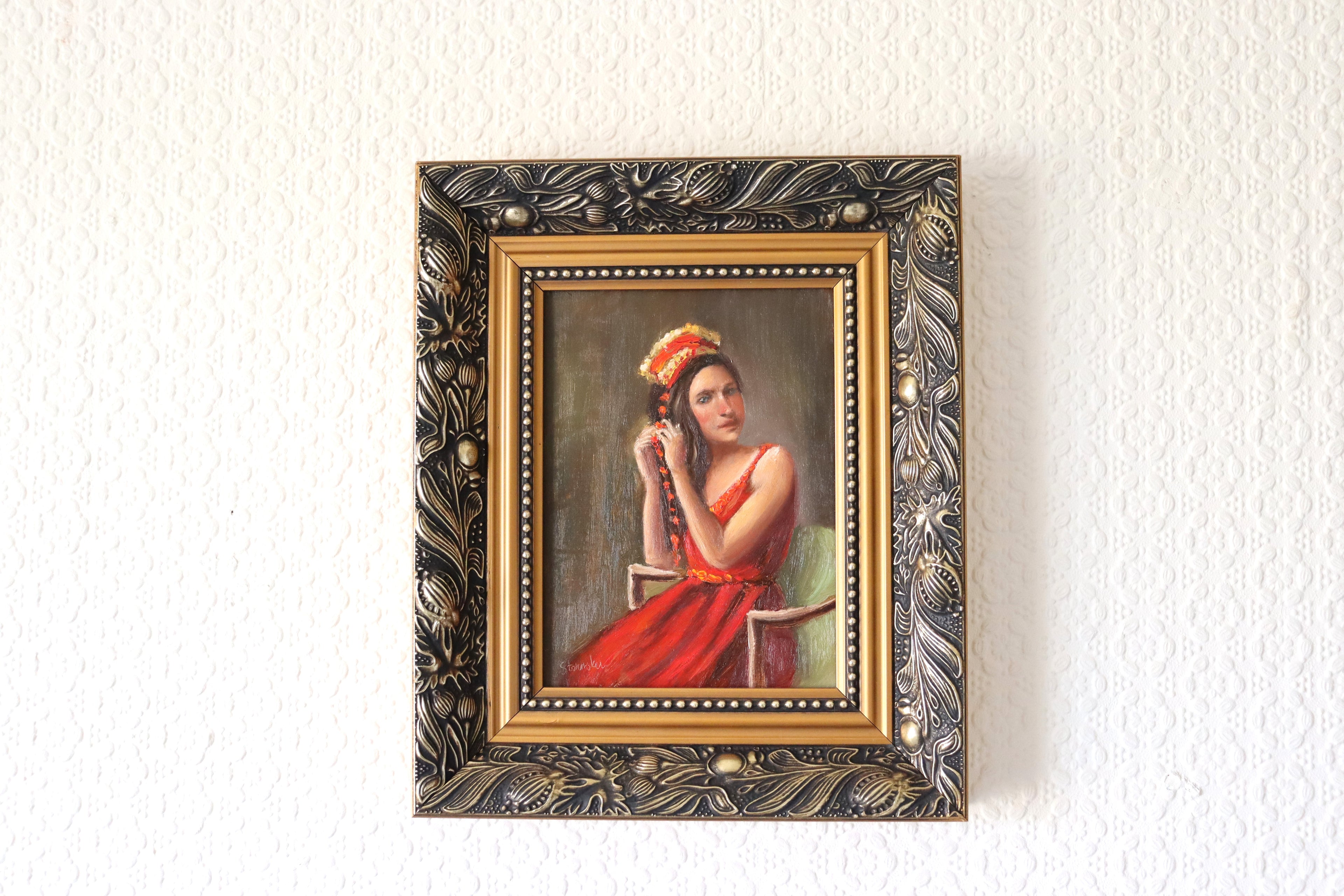 Woven in Tradition original oil painting in gold frame - sitting figure study of woman in traditional red dress and shawl braiding, 25.5x30.5cm framed by Marta Stolarska Fine Art, ready to hang