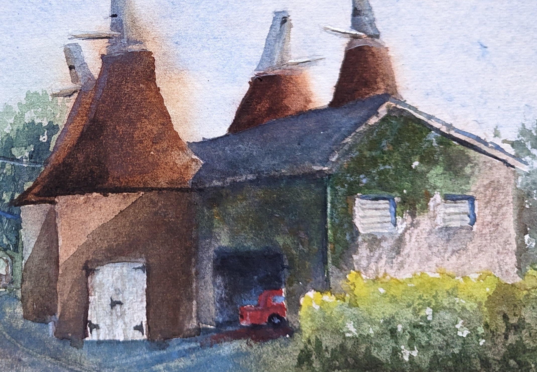 Watercolor painting of a rustic building with thatched roofs and a red vehicle in the foreground. Original watercolour painting of old oast houses in English countryside, half observed half imagined, Kent landscape